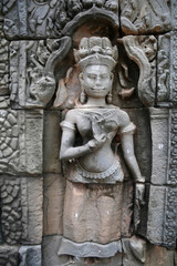 Fototapeta na wymiar Angkor temple complex. Ta Prohm temple. Apsara. Cambodia.