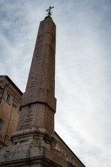 Famous egyptian obelisk in Urbino, renassance city in Italy. The monument is in Rinascimento Square near the ducal palace - 580771242