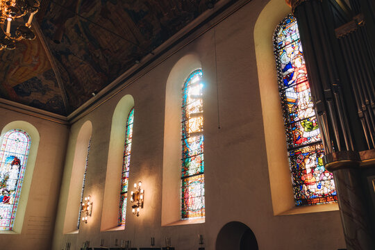 Beautiful interior of windows and art pattern shining in Oslo Cathedral