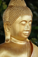 Detail of a Buddha statue in a Wat Khao Takiab temple, Hua Hin. Thailand.