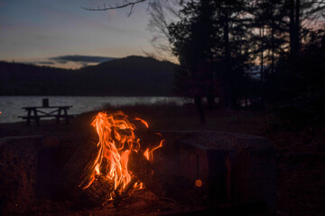 A campfire is set during the last wisks of light