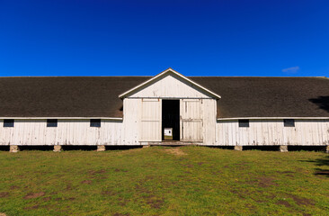 Historic wooden barn on rural dairy farm in Northern California