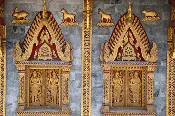 Temple windows, Wat Tung Yu, Chiang Mai. Thailand.