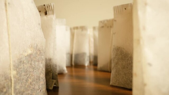 Scroll between tea bags on the table