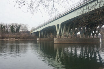 Light Green Bridge over River Water in Winter