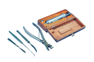 Ancient hospital for treatment soldiers on battlefield - 18th or 19th century, isolated on a white background. Forceps, syringe, scissors, scalpel and other medical instruments