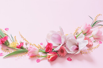 Naklejka na ściany i meble beautiful spring flowers on pink background