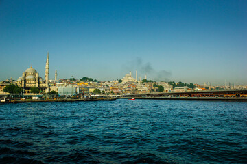 Bosphorus beaches and ferries carrying people