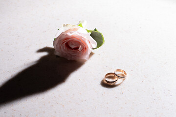 wedding rings on the background of a bouquet. idea for event agencies