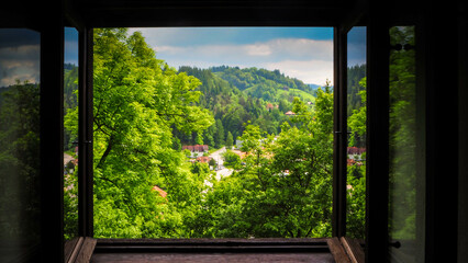 Windows view from Dracula's Castle, also known as Bran Castle, is a famous tourist attraction in Romania located in the Transylvania region - obrazy, fototapety, plakaty