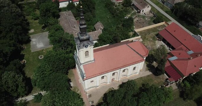 Flying over Ortodox Church.
Flight of the camera over the Orthodox Church.
Rural ortodox Church and countryside.
Aerial: Flying over forest and church
Aerial view of Ortodox church in countryside.
