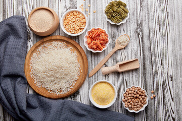 Assortment of gluten free pasta and porridges. Concept of FODMAP, paleo, keto, long carbs flat lay vegan food