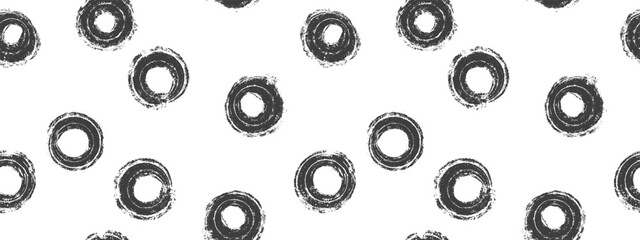 Grunge circles abstract seamless pattern. Monochrome randome black spots on white, brush hand drawn background. Vintage rings. Dots chaotic vector ornament. Design for fabric, textile, wrapping.