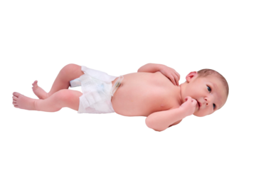 A newborn baby in diapers on a white changing table with a ruler for measuring full height, isolated on a white background