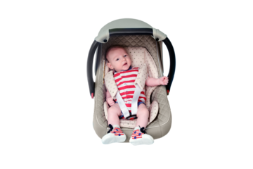 Baby in infant car seat on blue studio background, isolated on a white background. Child in the clothes of the red and white USA flag. Kid aged two months