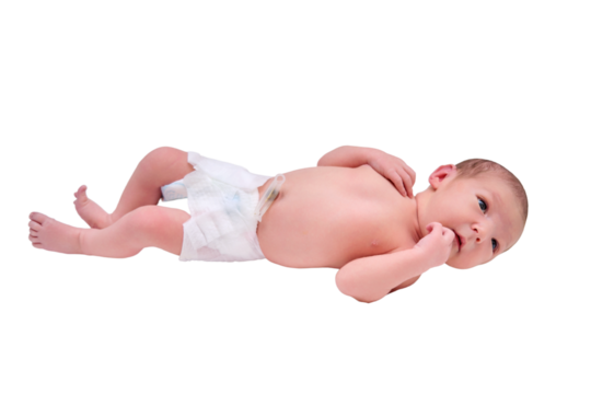 A newborn baby in diapers on a white changing table with a ruler for measuring full height, isolated on a white background