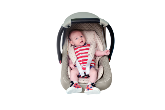 Baby in infant car seat on blue studio background, isolated on a white background. Child in the clothes of the red and white USA flag. Kid aged two months