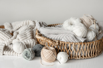 Fototapeta na wymiar Basket with yarn close-up, threads for knitting.