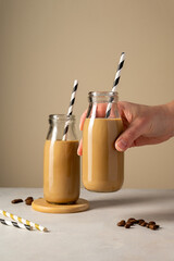 Coffee or chocolate drinks in glass bottles, iced coffee. 