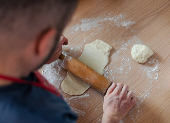 the process of making chocolate cake by a man in the kitchen