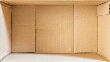Open empty brown cardboard box background top view
