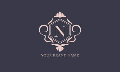 Exquisite baroque pattern. Floral ornament with initial letter N. Vintage frame, greeting card, wedding invitation. Vector logo template, label, business sign.