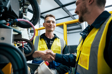 Multiracial tachnicial engineer training with robot arm