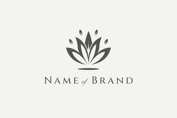 Vector logo on which an simple flat image of a blooming lotus flower.