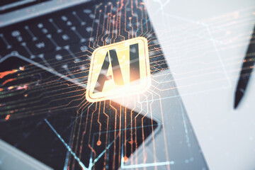 Double exposure of creative artificial Intelligence icon with modern laptop on background. Neural networks and machine learning concept