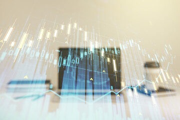 Double exposure of abstract creative financial diagram on modern laptop background, banking and accounting concept