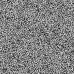 Black and white seamless pattern in polka dot style. Grunge ink texture. Vector illustration.