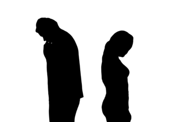 Silhouette of sad man and woman in a quarrel, isolated on a white background. Divorce of husband and wife in the evening light of the home living room