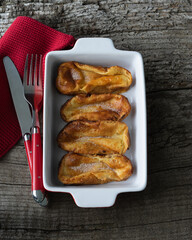 Torrijas. Typical food of Spain at Easter. Copy space. Torrijas in white tray. Top view.