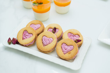 Desserts at the candy bar for valentine's day, shortbread in the shape of a heart