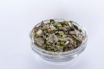 Origanum dictamnus, Dittany of Crete tea in a glass bowl on a white background. Cretan dittany or...