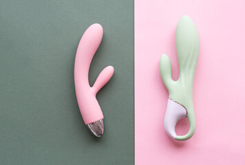 A set of toys for adults on a green and pink background - 580803293