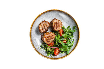 Grilled pork medallions steaks, tenderloin fillet with salad in plate.  Isolated, transparent...