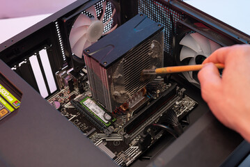 Dirty cooler ventilation system unit computer, cleaning from dust.