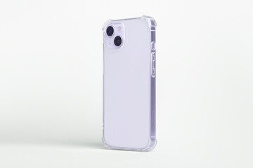 Phone case mock up side view. purple iPhone 14 plus in clear transparent soft silicone case...