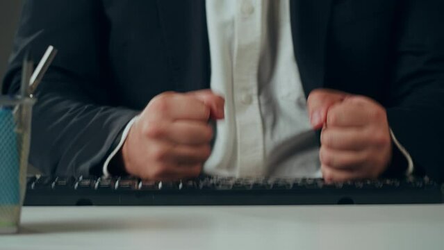 Aggressive man at work, Computer failure, error, stress at work concept. Mad impulsive crazy adult guy breaks down laptop, office worker pushing monitor and keyboard