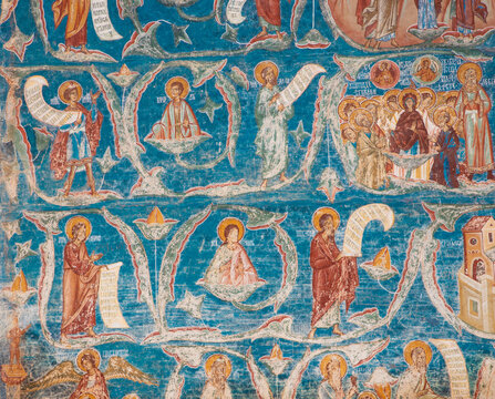 Religious paintings on the wall of Voronet monastery - Romania