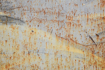 Rusty tin background with earth colors