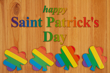 Happy Saint Patricks Day greeting with rainbow shamrocks