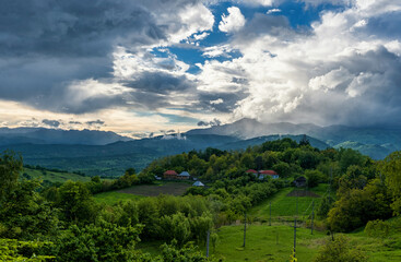 Fototapeta na wymiar Landscape Nature in Romania. Mountains and Cloudy Sky