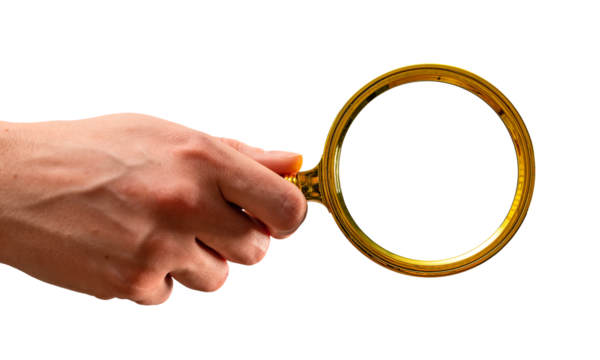 Hand holding magnifying glass, loupe isolated on white background. Search information, research and analysis concept