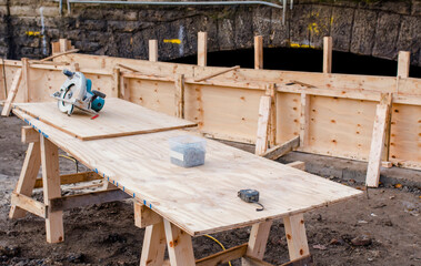 Hand held circular saw on workbench