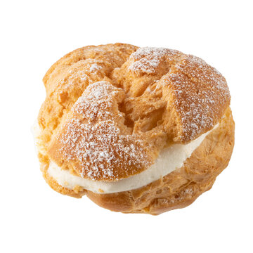 Cream puff, pastry from choux covered sugar powder closeup isolated 