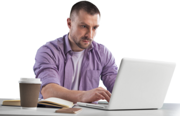 Young man programmer in spectacles for vision protection working remotely on laptop