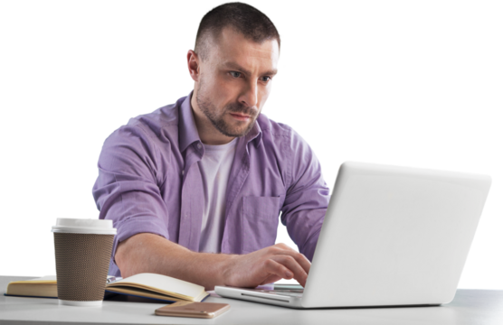 Young man programmer in spectacles for vision protection working remotely on laptop - Powered by Adobe