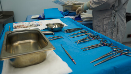 operating room equipment. Sterilized operating room equipment on the blue table.